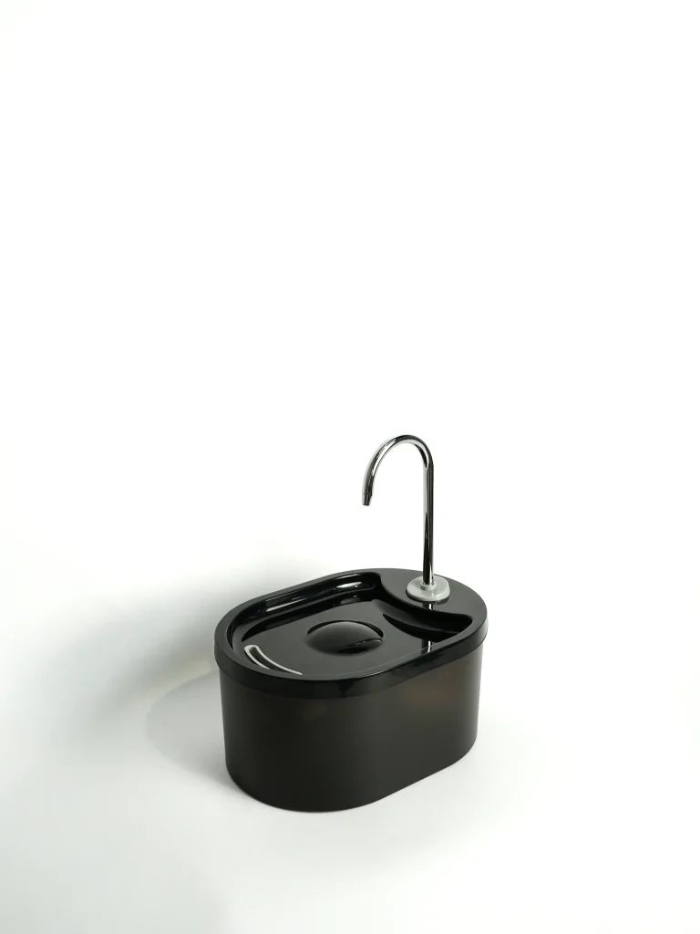 Side profile of the Faucet Style Pet Water Fountain - White, demonstrating the easy-maintenance basin for indoor use.