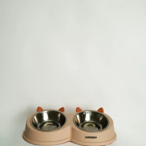 White Cat Ear Double Pet Bowl on a modern stand, showing the sleek, whisker-friendly design for food and water.