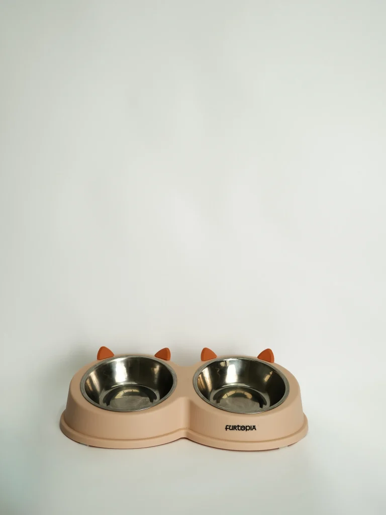 White Cat Ear Double Pet Bowl on a modern stand, showing the sleek, whisker-friendly design for food and water.