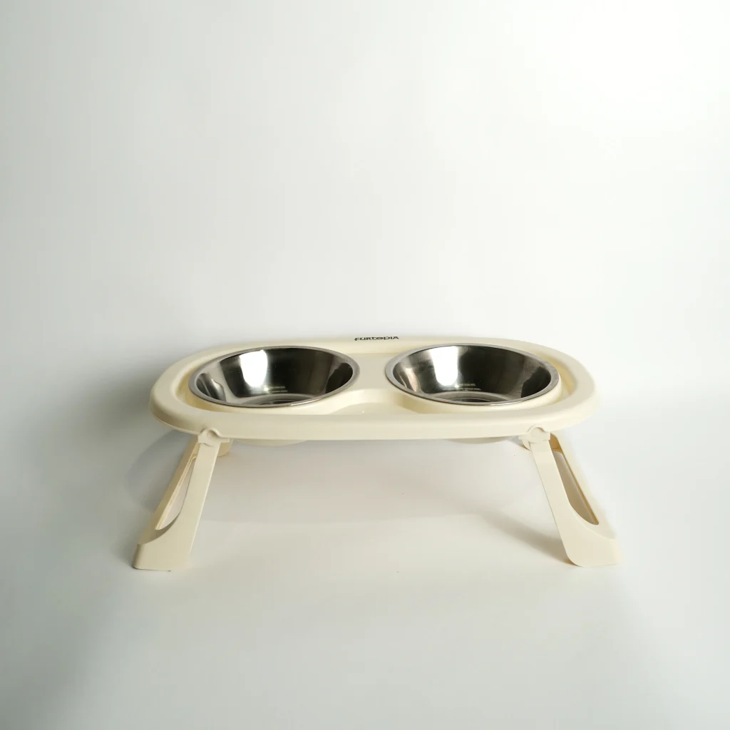 Front view of the Elevated Double Pet Feeding Bowl – Cream, showing the ergonomic raised design for neck comfort.