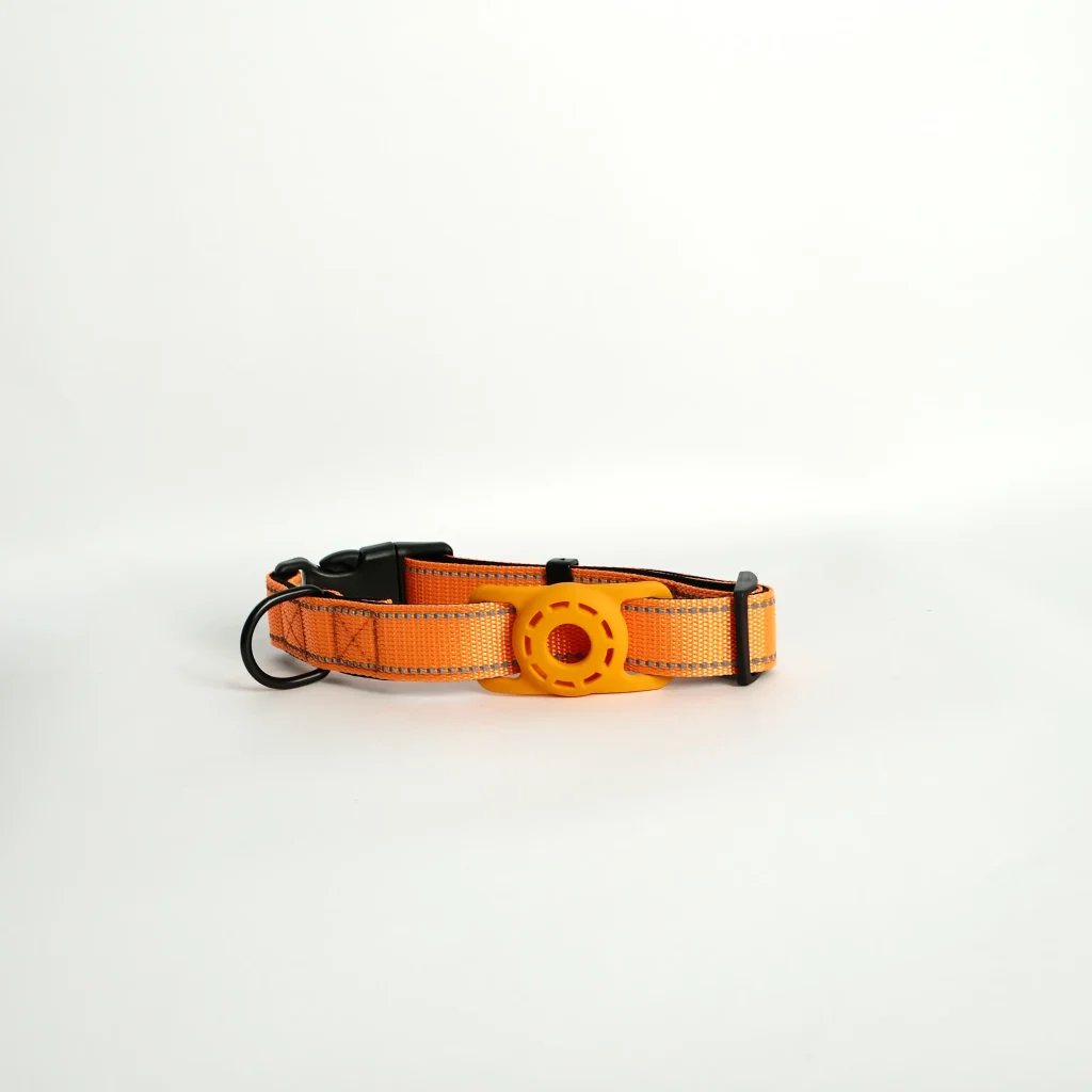 Detail shot of the Furtopia peach AirTag collar, showcasing the lightweight material and adjustable sizing strap.