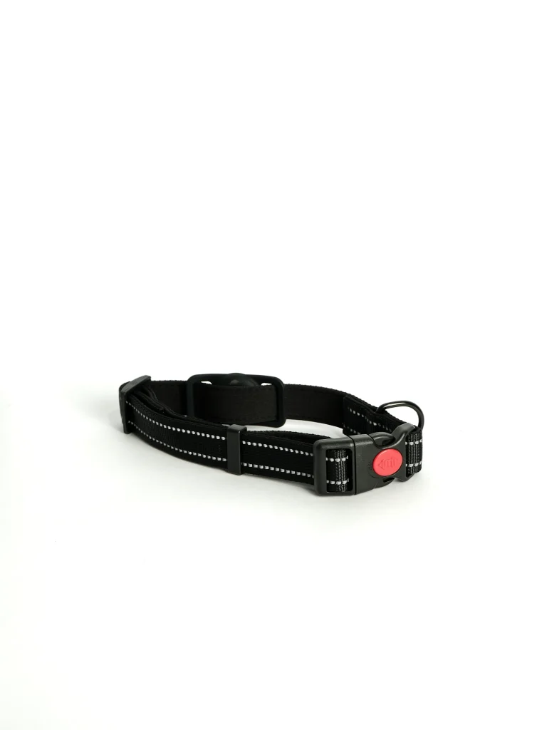 Black Apple AirTag Dog Collar featuring a built-in protective holder for a GPS pet tracker, shown on a plain background.