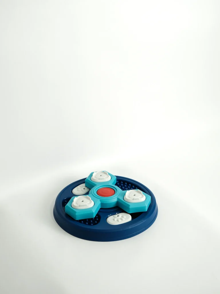 A side view of the Interactive Dog Feeder Toy Circle Base illustrating the adjustable difficulty and slow feeder levels.