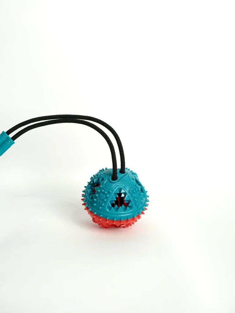 The Cat Ear Double Pet Bowl design element on this versatile Dog Chew and Feeder Toy for treats.