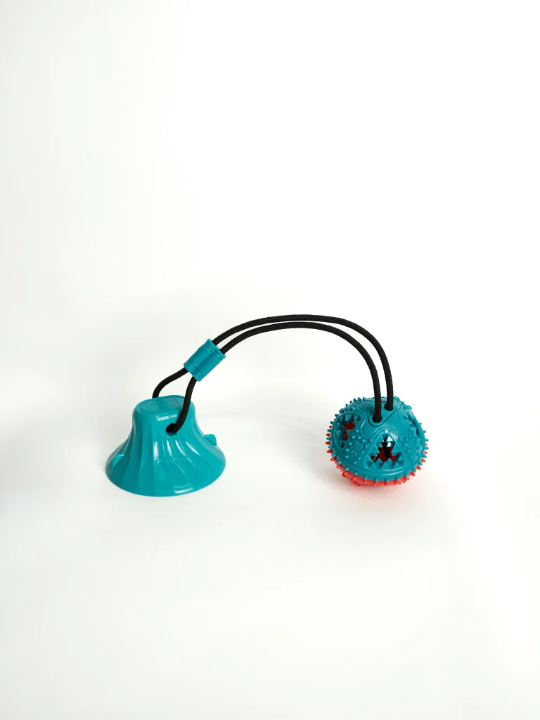 Durable Dog Chew and Feeder Toy in a vibrant color, designed for aggressive chewers and interactive play.