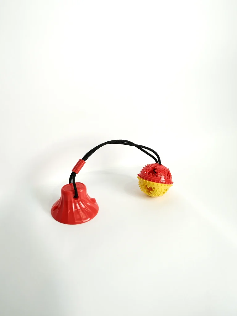 Professional studio shot of the Dog Chew and Feeder Toy demonstrating its flexible yet sturdy material.