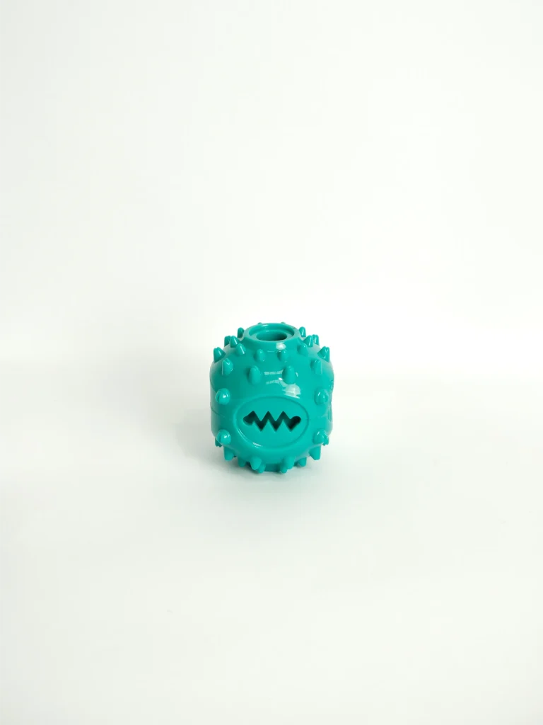 Dog enrichment feeder toy filled with yogurt and berries to help reduce anxiety and encourage slow eating.